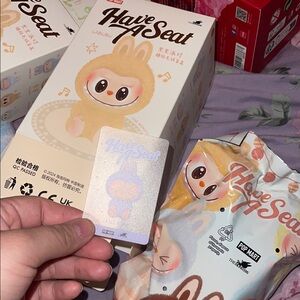 Have a seat labubu. ( zizi)